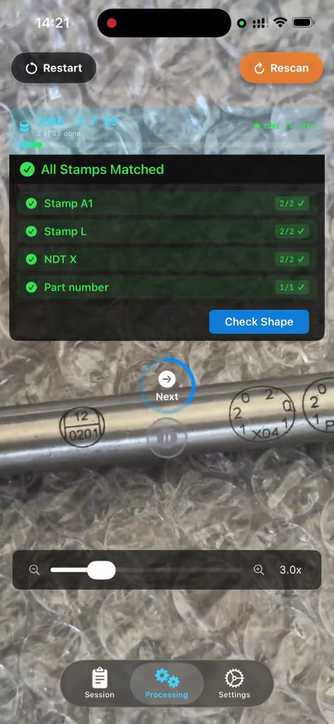 Stamp inspection — all required stamps matched on a metal tube
